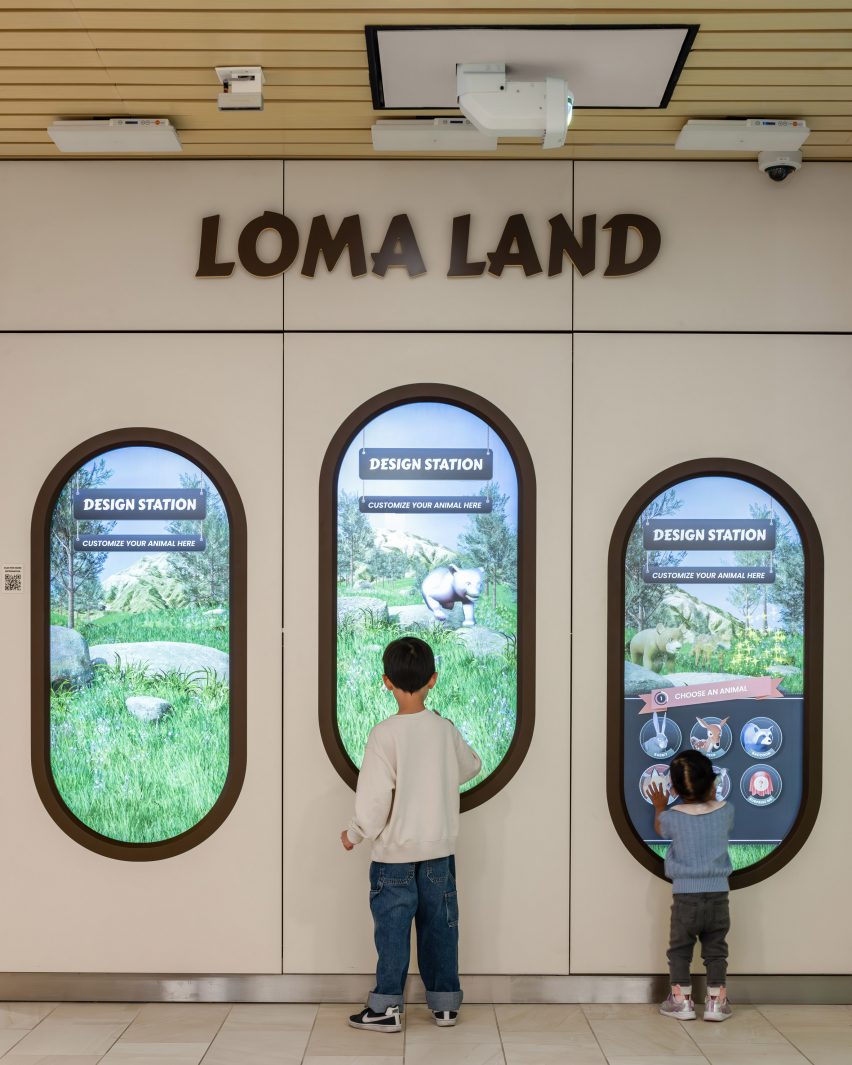 Oval media displays built into wall