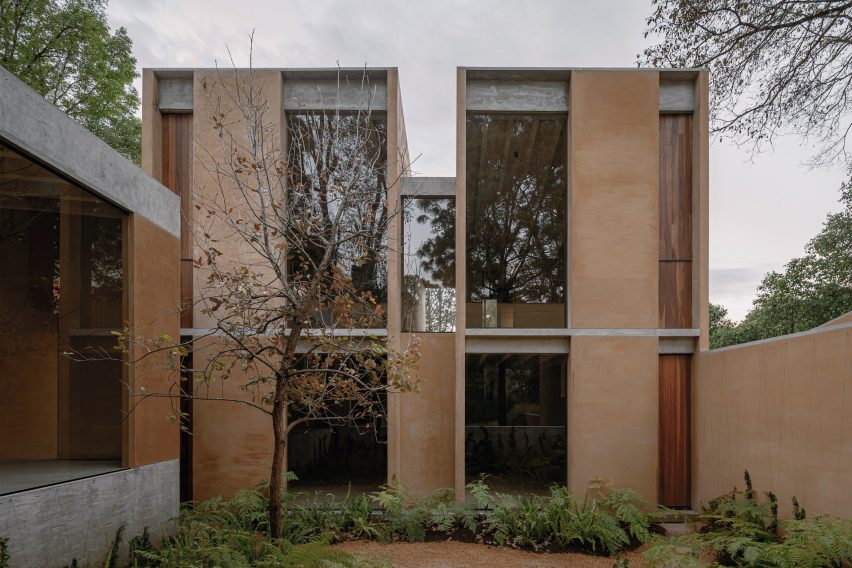 A courtyard of a building with tall windows