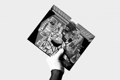 a hand holding a book