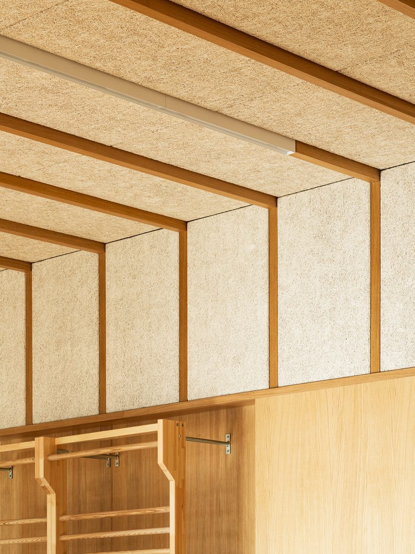 Kindergarten gym perforated wood ceiling