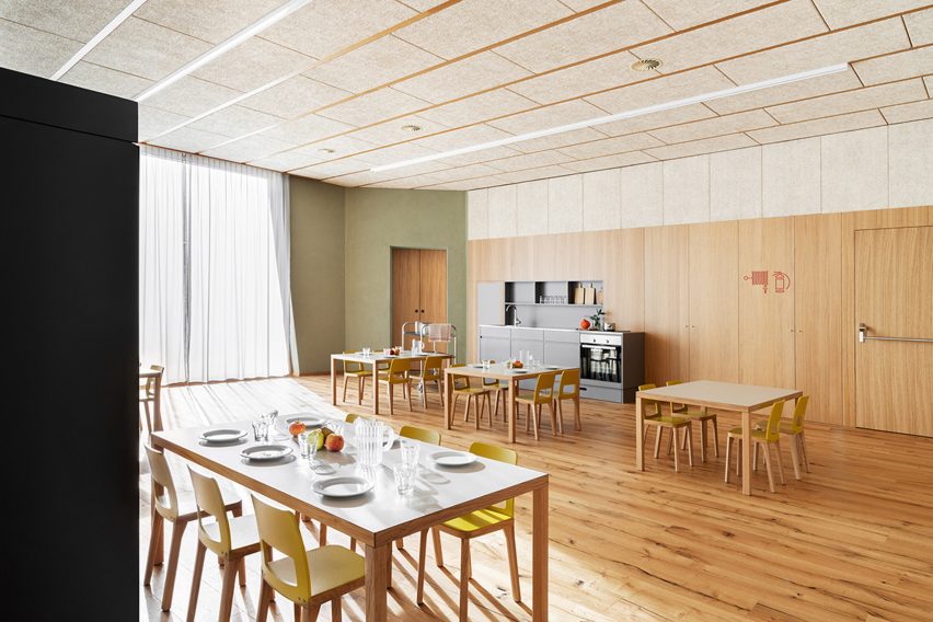 Kindergarten dining hall with dishes on the tables