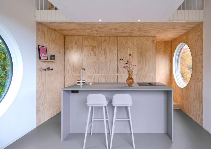 Timber-cladded compact kitchen