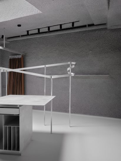 Display tables and rails inside Natalino boutique