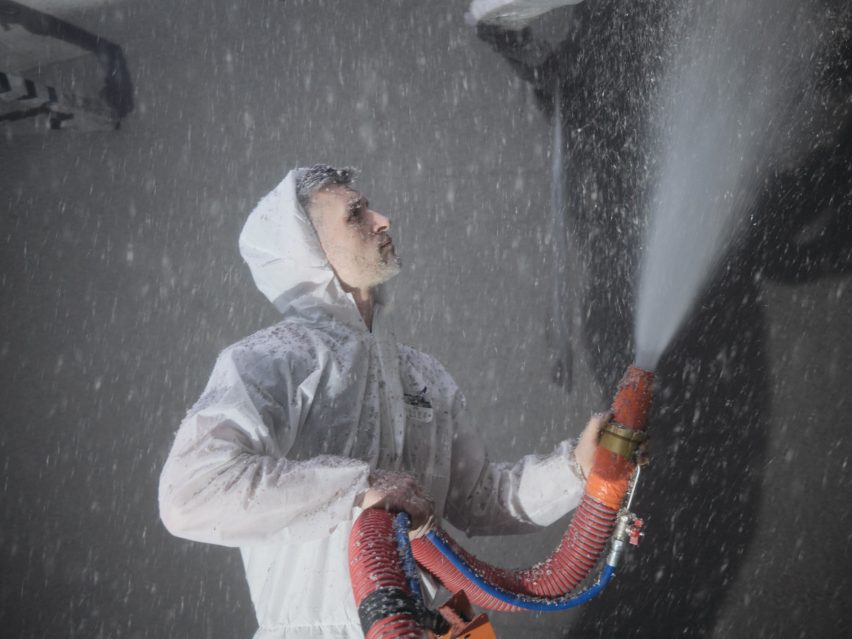 Paper pulp being sprayed across Natalino boutique in London by Mooradian Studio