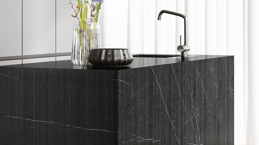 Photo of the New Marquina Bamboo stone finish by Antolini cladding a kitchen island