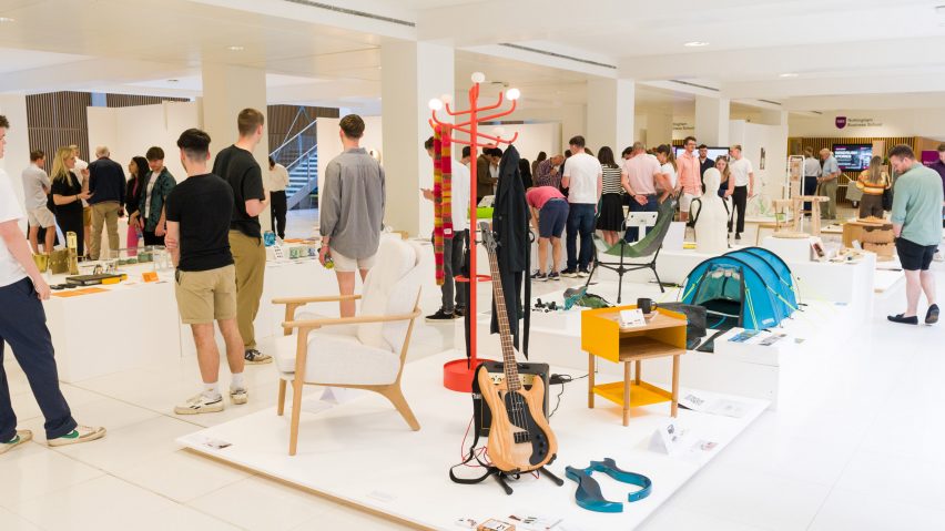 students at a product design exhibition