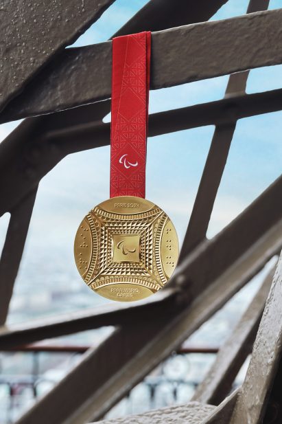 Front of gold Paralympic medal