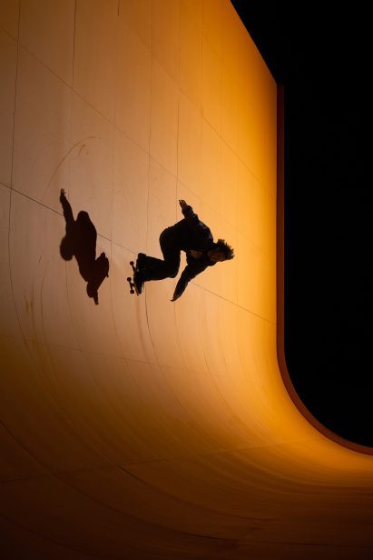 Siloutte of skater on vertical skate wall