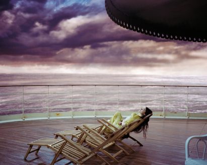 Woman on deck of cruiseship