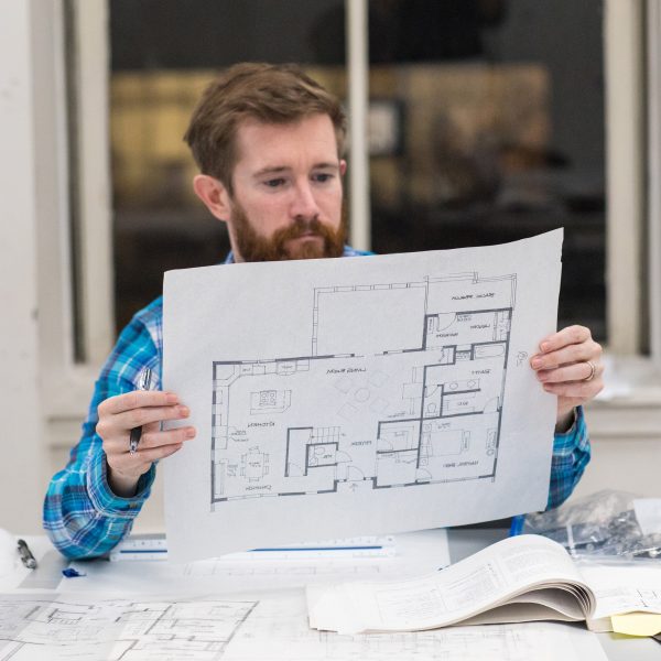 man reading building plan