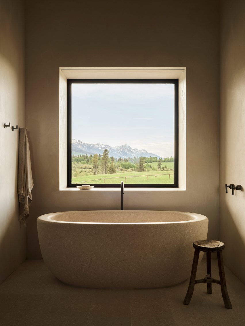 A bathtub with picture window