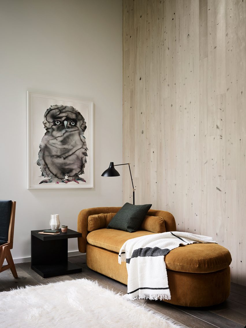 A chaise lounge with blanket