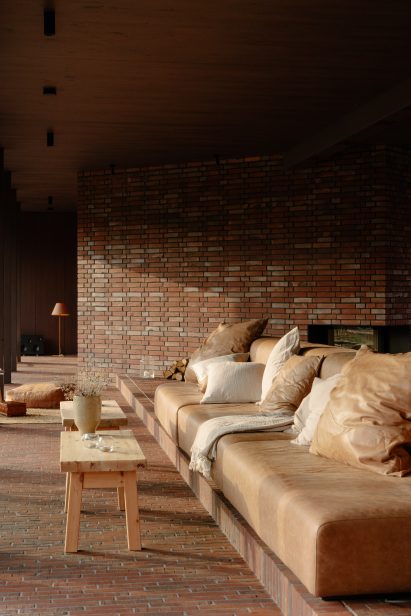 Seating area within hotel wing by Sigurd Larsen