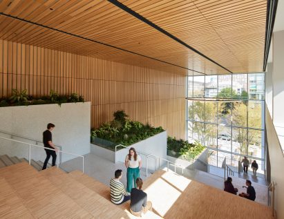 Wooden social staircase with terrazzo elements