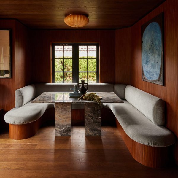 U-shaped breakfast nook in a wood-lined interior