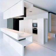 Corian Solid Surface range used across kitchen countertops in a Berlin apartment