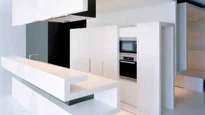 Corian Solid Surface range used across kitchen countertops in a Berlin apartment