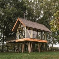 Exterior of glass micro house by Jan Tyrpekl in Austria