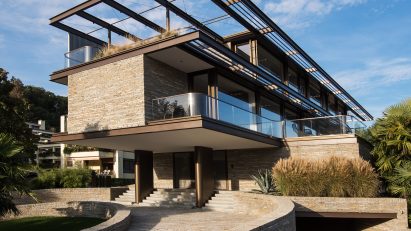 Exterior of rectilinear cantilevered house by Küchel Architects in Switzerland