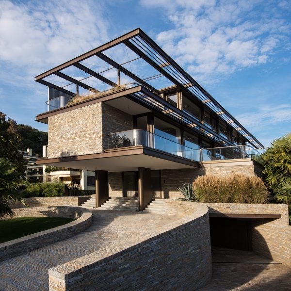 Exterior of rectilinear cantilevered house by Küchel Architects in Switzerland