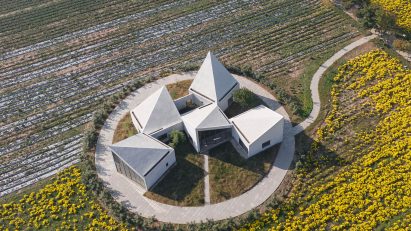 The Library in Ice-Chrysanthemum Field by Atelier Xi