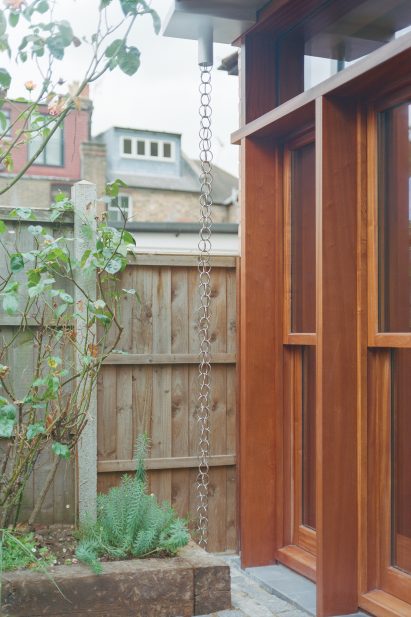 Rain chain outside timber extension