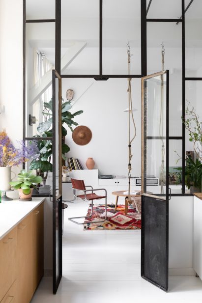View from kitchen to living room of apartment by Isabelle Heilmann