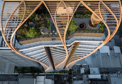 Weaving timber roots of facade by Koichi Takada Architects
