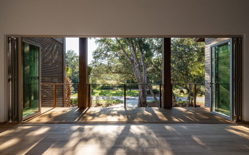 A house with large floor-to-ceiling windows