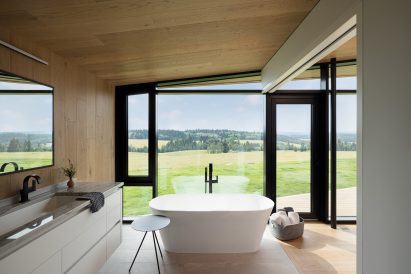 Floor-to-ceiling windows with black frames