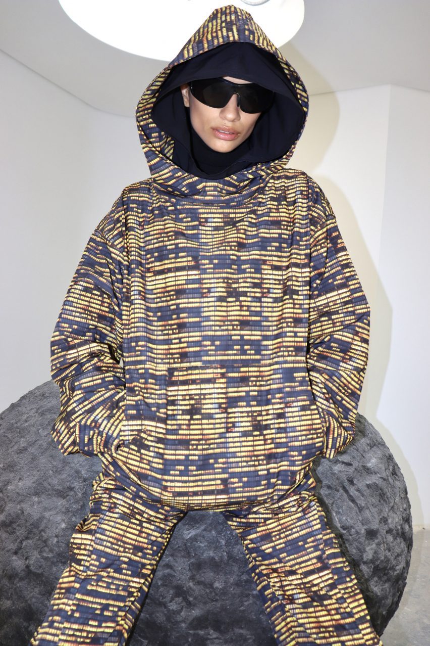 Person sitting on circular stool