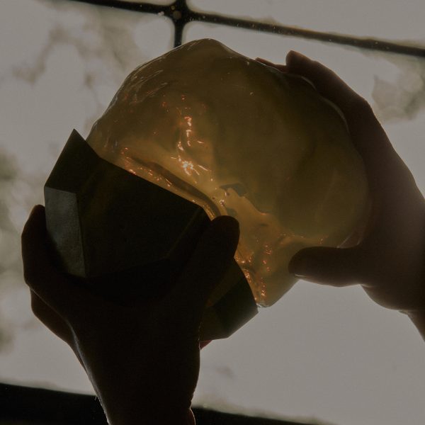 Photo of person holding lighting informed by a constellation
