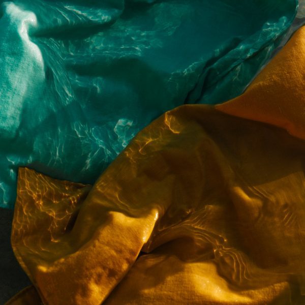 Photo of green and orange linens