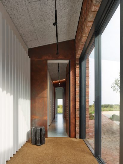 Corridor within Oxfordshire home by Richard Parr Associates