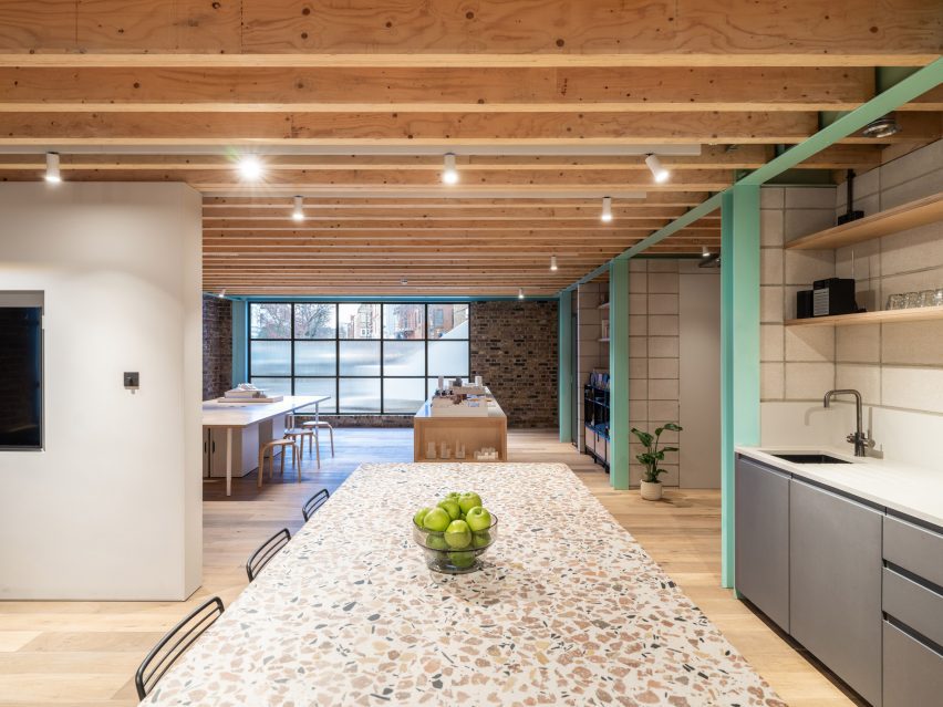 Kitchen with terrazzo counter of Addison Studios by Tigg + Coll Architects