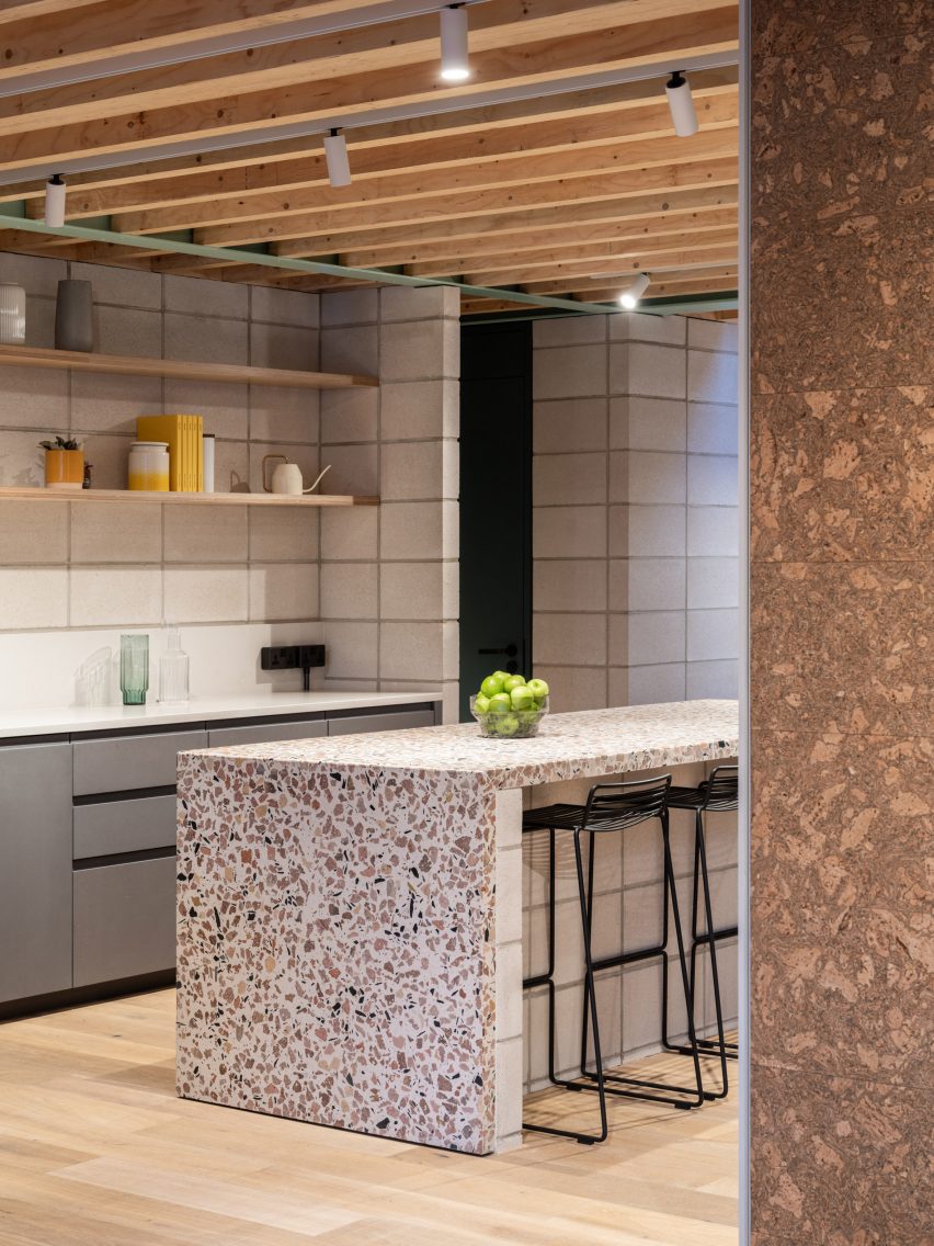 Kitchen with terrazzo counter of Addison Studios by Tigg + Coll Architects