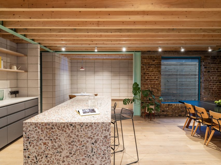 Kitchen with terrazzo counter of Addison Studios by Tigg + Coll Architects