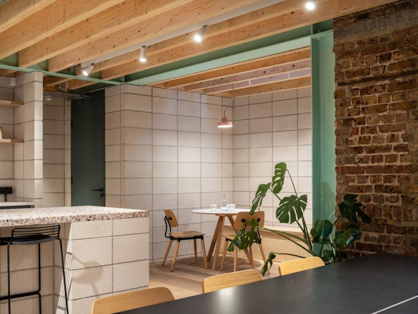 Kitchen with terrazzo counter of Addison Studios by Tigg + Coll Architects