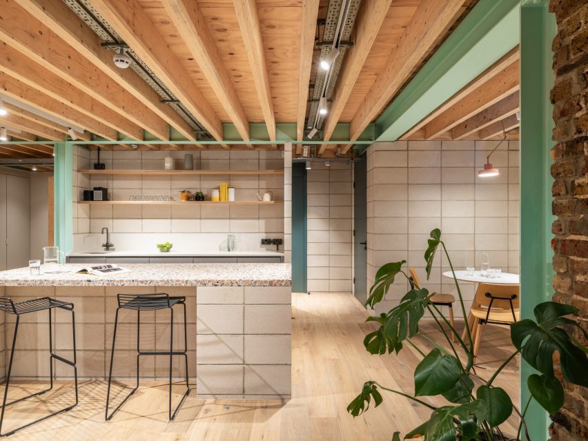 Kitchen with terrazzo counter of Addison Studios by Tigg + Coll Architects