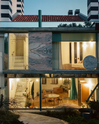 Garden-facing facade with chunky marble decoration