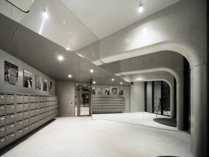 Entrance lobby at the twisting landmark by Hamonic + Masson & Associés