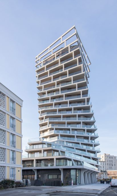 Facade of twisting residential building by Hamonic + Masson & Associés