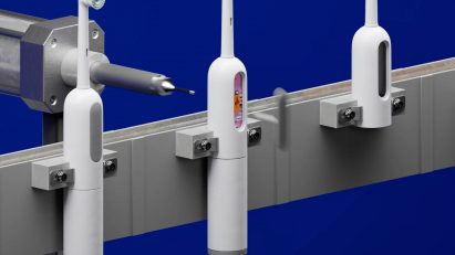 3D graphic showing a conveyer belt of electric toothbrushes being disassembled in Seymour Powell's Un-Made concept