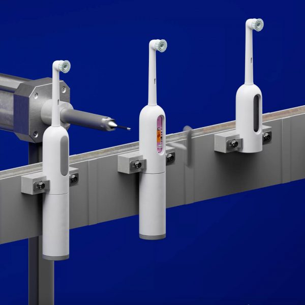 3D graphic showing a conveyer belt of electric toothbrushes being disassembled in Seymour Powell's Un-Made concept