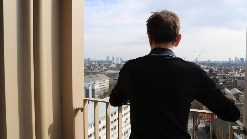 Charles Curtis looking at the view from his council flat in Westminster
