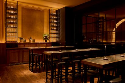Area with high-top tables reserved for walk-in diners