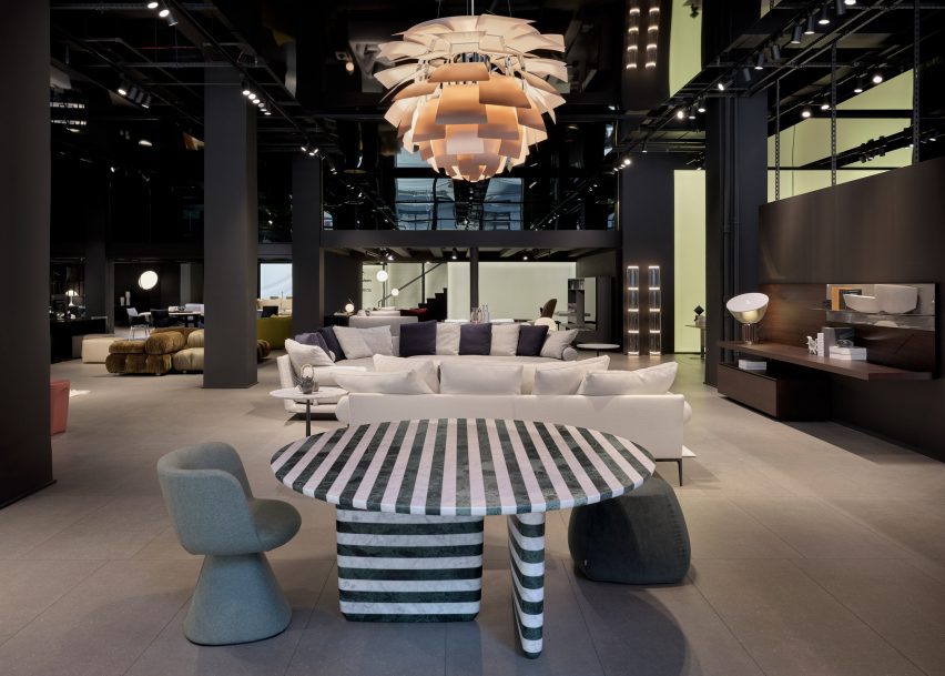 A showroom with a striped table