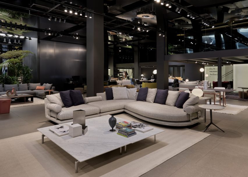 A showroom with gray furniture