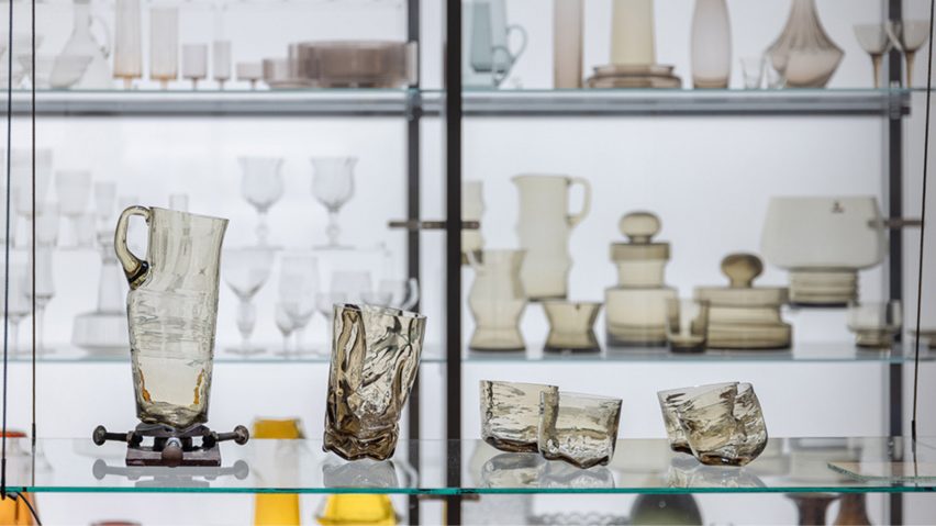 a photograph of glassware on shelves