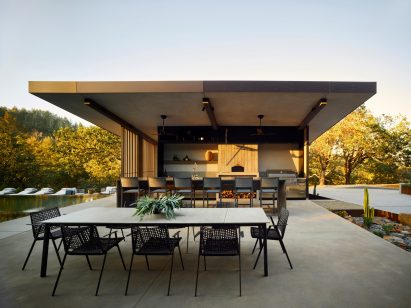 Deck with a dining table and chairs